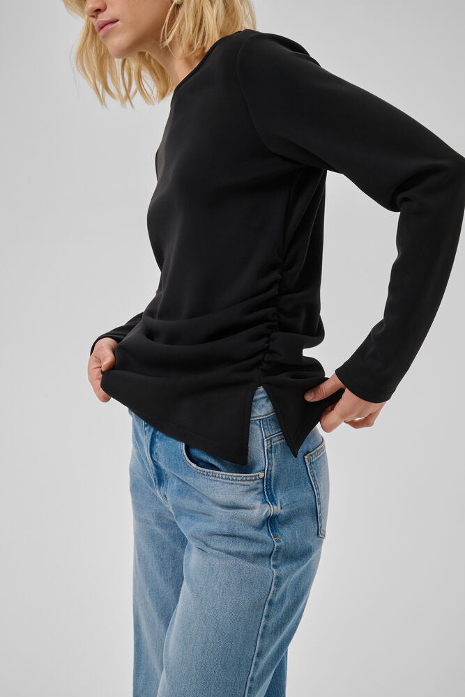 My Essential Wardrobe Helle Asymmetric Top in Black